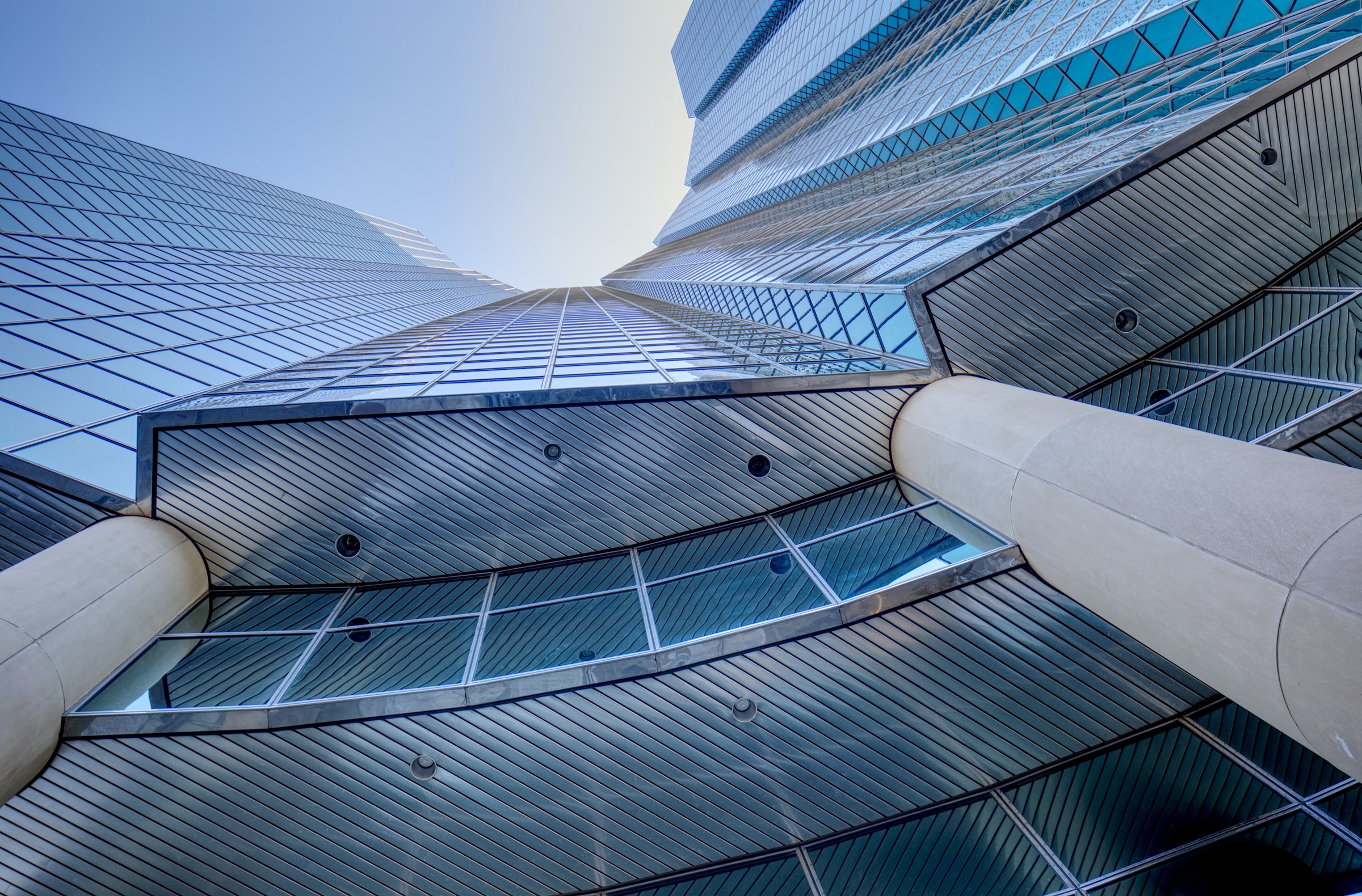 The repeating geometry of a contemporary glass building